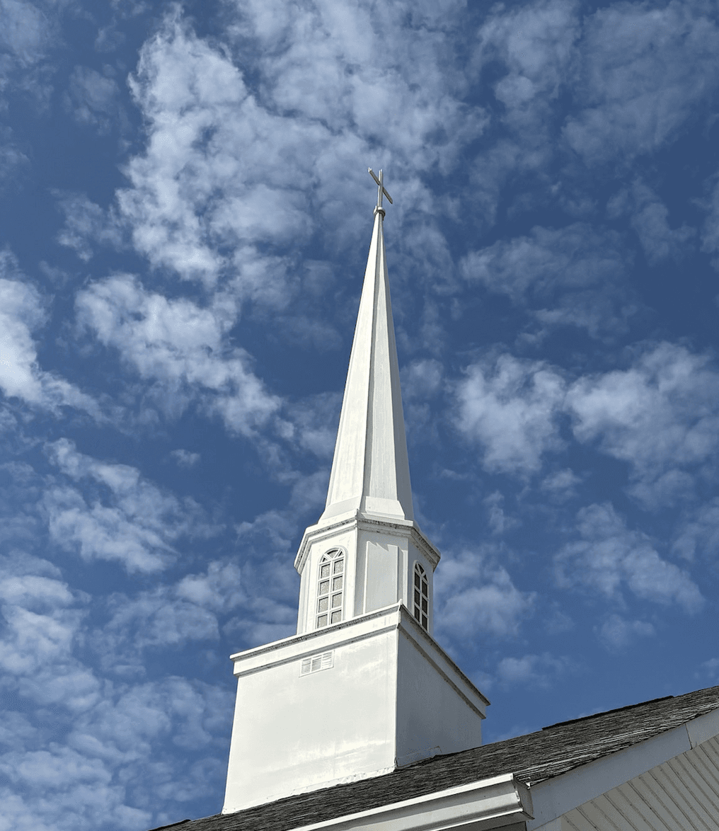 Church steeple reaching toward the sky